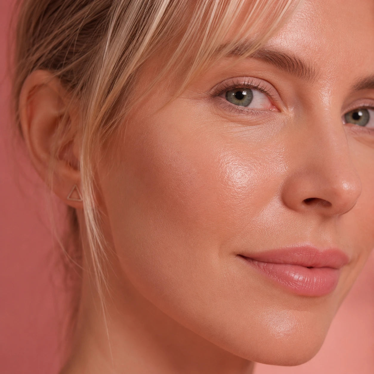 Portrait of a blonde woman with clean, natural-looking skin