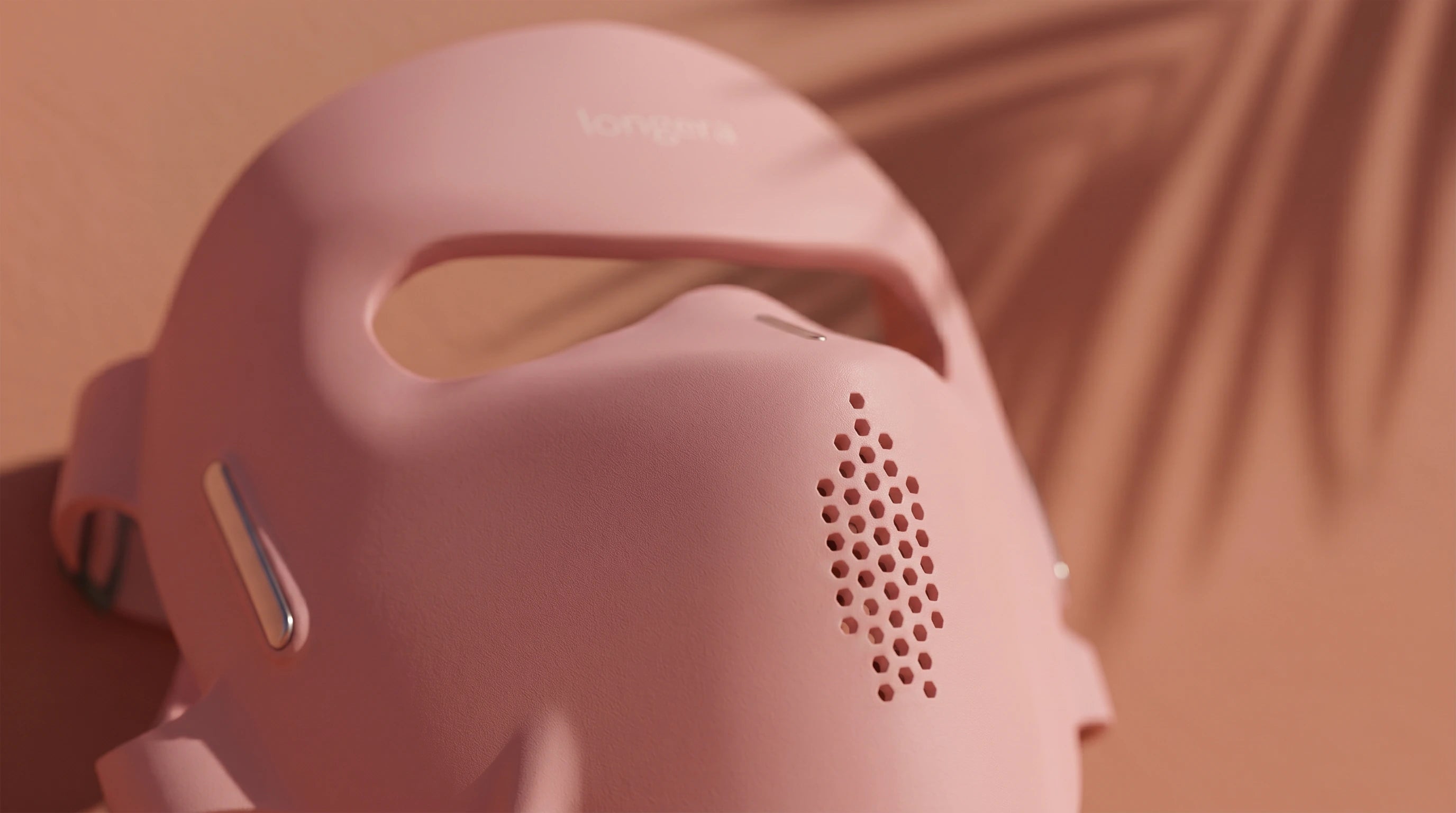 Close-up of the Longera AVA LED face and neck mask highlighting its flexible silicone design