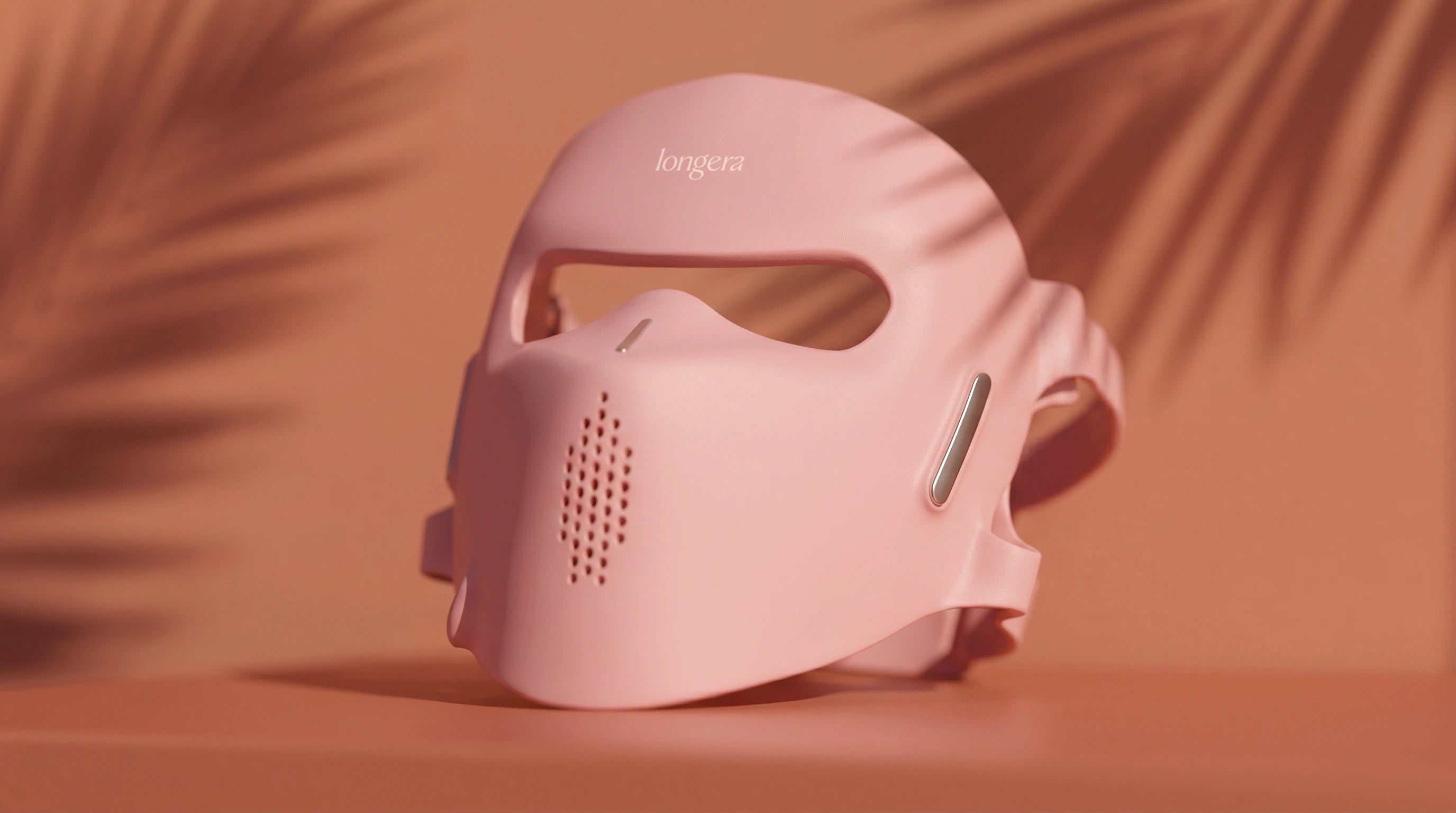 Close-up of the Longera AVA LED face and neck mask showing its flexible silicone design
